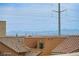Las Vegas skyline with layered rooftops gives the home a great elevated view to the south at 10722 Red Badge Ave, Las Vegas, NV 89166