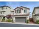 Beautiful two-story home with a two-car garage, desert landscaping, and a covered front entrance at 10722 Red Badge Ave, Las Vegas, NV 89166