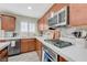 Stylish kitchen with stainless steel appliances and white countertops at 10722 Red Badge Ave, Las Vegas, NV 89166