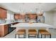 Open-concept kitchen with a large island and stainless steel appliances at 10722 Red Badge Ave, Las Vegas, NV 89166
