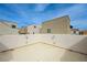 Rooftop deck with stucco walls and neighborhood views under a clear blue sky at 10722 Red Badge Ave, Las Vegas, NV 89166