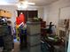 Unfinished basement with a collection of moving boxes, tools, and other personal belongings at 110 Palm Ln, Las Vegas, NV 89101