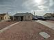 A quaint single-story home with a xeriscaped front yard and sidewalk at 110 Palm Ln, Las Vegas, NV 89101