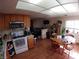 Open kitchen featuring light wood cabinets and a dining nook with hardwood floors at 110 Palm Ln, Las Vegas, NV 89101