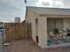 Side view featuring a covered patio area and access to the property's fenced-in yard at 110 Palm Ln, Las Vegas, NV 89101