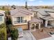 Lovely aerial view of a two-story home with a tile roof in a well-kept neighborhood at 1309 Rainy Sky Ave, North Las Vegas, NV 89030
