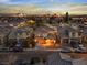 Perfectly positioned home with balcony and covered porch in a neatly arranged residential setting and skyline at 1309 Rainy Sky Ave, North Las Vegas, NV 89030