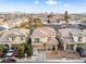 Beautiful aerial view of a two-story home with a tile roof in a well-kept neighborhood at 1309 Rainy Sky Ave, North Las Vegas, NV 89030
