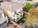 Aerial view showcasing a backyard with artificial turf, balcony, and outdoor seating area at 1309 Rainy Sky Ave, North Las Vegas, NV 89030