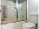 Bathroom with shower and toilet features new plumbing and clean surfaces at 1309 Rainy Sky Ave, North Las Vegas, NV 89030