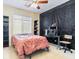 Bedroom featuring a desk, window, and carpeted floors at 1309 Rainy Sky Ave, North Las Vegas, NV 89030