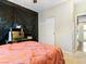 Comfortable bedroom features neutral walls, plush carpet, and a sliding closet at 1309 Rainy Sky Ave, North Las Vegas, NV 89030