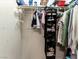 Storage closet with installed hanging racks and shoe storage at 1309 Rainy Sky Ave, North Las Vegas, NV 89030