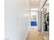 Hallway with views into bathroom and closet offers plenty of space at 1309 Rainy Sky Ave, North Las Vegas, NV 89030