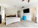 Bright main bedroom offers carpet floors, ceiling fan, and ample closet space at 1309 Rainy Sky Ave, North Las Vegas, NV 89030