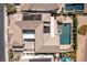 An aerial view shows a home with a pool, spa, solar panels, and well-manicured landscaping at 2001 Alcova Ridge Dr, Las Vegas, NV 89135
