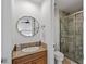 Bathroom featuring a granite vanity, toilet, and glass enclosed shower at 2001 Alcova Ridge Dr, Las Vegas, NV 89135