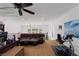 Upstairs loft featuring a leather couch, work-out bike, and desk space at 2001 Alcova Ridge Dr, Las Vegas, NV 89135