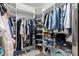 Spacious walk-in closet with custom shelving and ample storage space for clothes, shoes, and accessories at 2001 Alcova Ridge Dr, Las Vegas, NV 89135