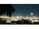 Distant city skyline with bright lights against a dark night sky at 228 E Van Wagenen St, Henderson, NV 89015