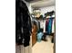 Walk-in closet providing plenty of storage space and organization for clothes and accessories at 228 E Van Wagenen St, Henderson, NV 89015