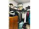 Organized closet with shelving, rods, and storage for clothes, shoes, and accessories at 228 E Van Wagenen St, Henderson, NV 89015