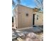 Charming home featuring a decorative sun adornment and minimalist landscape at 228 E Van Wagenen St, Henderson, NV 89015