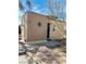 Simple house front exterior with block construction and desert landscape at 228 E Van Wagenen St, Henderson, NV 89015