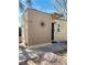 Simple house front exterior with block construction and desert landscape at 228 E Van Wagenen St, Henderson, NV 89015