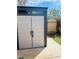 View of the backyard storage shed featuring double doors and backyard access, perfect for outdoor organization at 228 E Van Wagenen St, Henderson, NV 89015