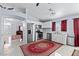 Bright and airy kitchen featuring marble floors, white cabinets, and stainless steel appliances at 2419 Country Orchard St, North Las Vegas, NV 89030