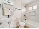 Contemporary bathroom showcasing marble tiled shower, modern vanity, and elegant mirror at 3309 Marionette Ave, Las Vegas, NV 89101