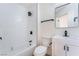 Modern bathroom featuring a shower-tub combo, sleek vanity, and updated fixtures at 3309 Marionette Ave, Las Vegas, NV 89101