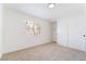 Light-filled bedroom featuring a spacious closet and a window with security bars at 3309 Marionette Ave, Las Vegas, NV 89101
