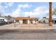 Charming single-story home with a xeriscaped yard and chain link fence at 3309 Marionette Ave, Las Vegas, NV 89101