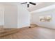 Spacious living room with a ceiling fan, and large window for natural light at 3309 Marionette Ave, Las Vegas, NV 89101
