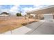 Expansive backyard featuring a covered patio for entertaining, with a privacy wall and ample open space at 3309 Marionette Ave, Las Vegas, NV 89101