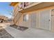 A two story apartment building featuring security doors and an exterior stairway at 3821 1/2 Daisy St # 25, Las Vegas, NV 89119