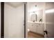 Modern bathroom featuring a tiled walk-in shower and white vanity at 3823 S Maryland Pkwy # L6, Las Vegas, NV 89119