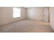 Large bedroom featuring plush carpet, white walls and natural light at 3823 S Maryland Pkwy # L6, Las Vegas, NV 89119