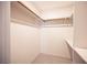 Walk-in closet featuring shelves and rods for extra storage at 3823 S Maryland Pkwy # L6, Las Vegas, NV 89119