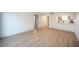 Spacious living room with hard surface floors and view of the kitchen at 3823 S Maryland Pkwy # L6, Las Vegas, NV 89119
