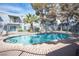 Community pool with clear water and lounging areas at 3823 S Maryland Pkwy # L6, Las Vegas, NV 89119