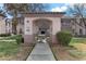 A welcoming building exterior with covered seating and lush landscaping at 4555 E Sahara Ave # 280, Las Vegas, NV 89104