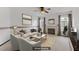 Bright living room with fireplace, neutral-toned furniture, and large windows allowing lots of natural light at 4555 E Sahara Ave # 280, Las Vegas, NV 89104