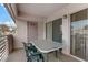 Relaxing balcony with seating for four offering views on a beautiful, sunny day at 4555 E Sahara Ave # 280, Las Vegas, NV 89104