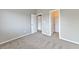 Neutral bedroom featuring carpet, light paint, closet and doors at 53 Blue Beak Way, Henderson, NV 89012