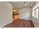 Dining area with hardwood floors and a view into the kitchen at 53 Blue Beak Way, Henderson, NV 89012