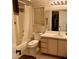 Neutral bathroom featuring a shower-tub combo, and a vanity with sink and storage space at 533 Calypso Dr, Henderson, NV 89002