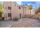 Spacious backyard has brick pavers and a covered patio at 5382 Runningbrook Rd, Las Vegas, NV 89120